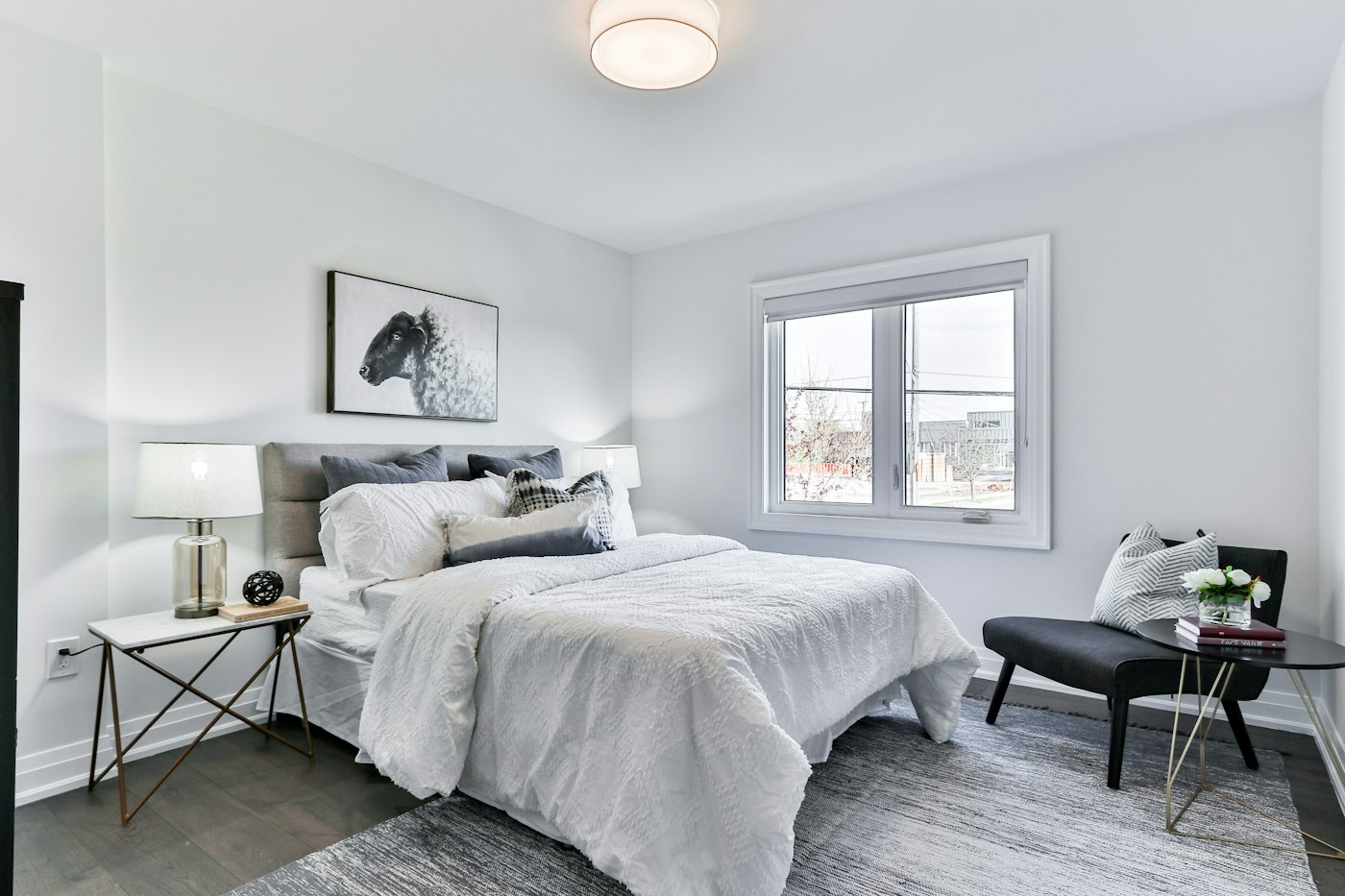 The Creek Suite, a larger room with a wood bed